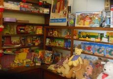 Toys and games fill every shelf in several rooms of the Greer Relief staging area. Remaining items will be forward to Greer's Cops for Tots program.