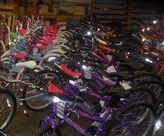 Bike are here, there and everywhere at the staging area for Greer Relief families. Resurgent Capital Services donated 130 bikes and helmets. 