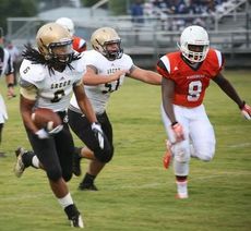 Emmanuel Kelly is on his way to the end zone as he scored one of three Greer touchdowns versus Mauldin Saturday in the J.L. Mann Jamboree.