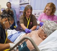 Students are often surprised by the lifelike appearance and reactions of high-tech teaching tools such as human patient simulators.
 