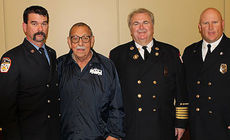Celebrating the Greer Fire Department's 100th anniversary at a dinner Saturday night at City Hall were, left to right, Senior Engineer Taylor Graham, retired Phoenix, Ariz., fire chief Alan Brunacini, Greer Fire Chief Chris Harvey and Capt. Josh Holzheimer.
 