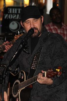 Arvie Bennett entertained his followers and crowd visiting the Mason Jar in downtown Greer. The Arvie Jr. Band was celebrating its CD release at a public party Saturday night.