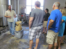 Brent Ludwig provides a tour for guests visiting Pisgah Brewing.
 