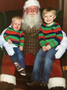Carter and his little brother, Charlie (1), at their annual visit with Santa. Carter loved him and Charlie wasn’t so sure.
 