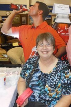 Kathy Couser had one of the best locations to sell tickets to her Meals On Wheels Pets project. A cutout of Clemson Head Football Coach Dabo Swinney stands behind her. It is a live auction item from 7-9 tonight at Fairview Baptist Church.