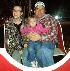 Kim, Madelyn and David Wooten enjoyed a photo opportunity in the sleigh.
 