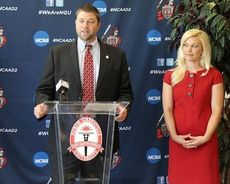 Landon Powell and his wife, Allyson, at North Greenville University announcing the former Gamecock as head baseball coach.
 
