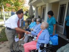 Lt. Governor Glenn McConnell visits with residents at Cottages at Brushy Creek. The 