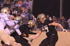 Mario Cusano is trapped in the Greer backfield,