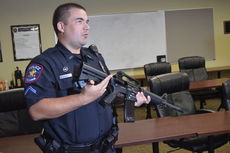 Clay Anderson, the GPD's field training officer, demonstrated the FireArm Training Simulator (F.A.T.S.).
 