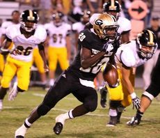 Greer's Quez Nesbitt has averaged over 200 yards rushing in the past two games. Greenville held the all-state running back to 110 yards last year.