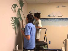 Students from St. Joseph’s Catholic School in Greenville donated their time and talent to paint a mural for hearing patients at Clarity.
 