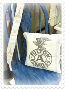 This blue chair was repurposed and is featured at Fresh Picked Vintage.
