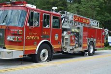 The entire left side of the Greer Fire Department ladder truck was damaged.
 