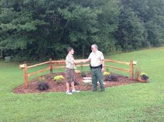 Ethan Ham gets congratulations from Lake Robinson game warden for a job well done
 