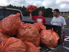 Fifteen volunteers collected 26 bags of trash and litter along Mays Bridge Road and around Lake Robinson Saturday.
 