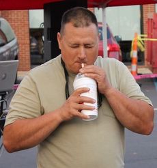 Shane Hubbard's expression shows what drinking a cold milkshake will do to one's senses.
 