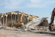 A storage warehouse at the Inland Port in Greer was the first building demolished since the groundbreaking on March 1.