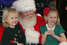 Santa Claus was holding court at the Greer Trading Post Thursday evening.
 