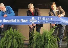 Mark Aycock (left), COO of Spartanburg Regional Healthcare System, Greer Mayor Rick Danner and Anthony (Tony) Kouskolekas, President of Pelham Medical Center, perform the traditional ribbon cutting for the new branding of the hospital.
 