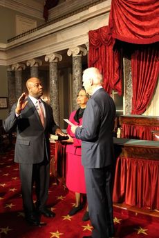 Senator Tim Scott with his mother, Frances Scott, and Vice President Biden being sworn into the United States Senate. 
 