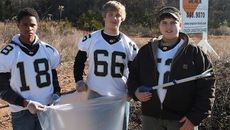 Nate Jefferson (18), Jesse Sudduth (66) and Gabe Hannon (52) cleared an area on Country Club Road near East Gap Road.
 