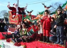 How lucky can you get? Children got to ride Santa's float during the Greer Christmas Parade.
 