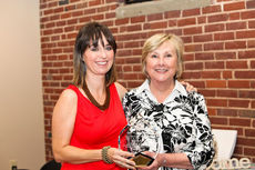 Julie McMakin, left, a member of the Foundation board, presented the Educator of the Year award to Wanda Fowler.