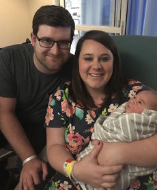 Amy and Jonathan Wilson with Elijah, born New Year's Day.
 