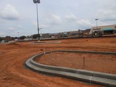 The Greer Plaza parking lot is getting a complete makeover with landscaped islands and improved lighting.