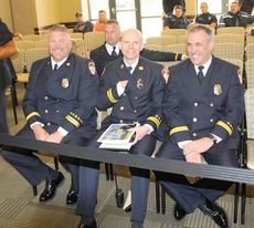 Fire Department Captains wait their turn to present the 2013 annual report to City Council Tuesday.
 