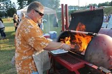 The tailgating chef in residence is Brian Green. He teaches physical education at Greer High and competes some weekends in the Kansas City Barbecuse Society cookoffs.