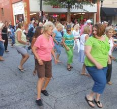 There was dancing in the streets as Encore entertained the Greer crowd during their first set Friday. 