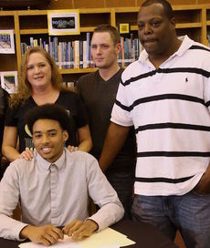 Dorian Lindsey had his family join him for the signing ceremony to attend Wofford College.
 