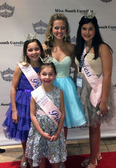 Emma Kate Rhymer, Miss Greater Greer Teen, is surrounded by her princesses, Abby Dill, Lillian Hannon and Ella Jane Lee in Columbia last weekend for the Miss South Carolina workshop.
 
 