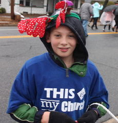 All bundled up and handing candy along the parade route.
 