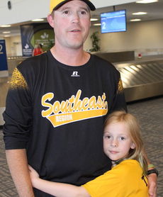 And when all the baggage was picked up and players left the GSP terminal, there was still daddy's little girl waiting for her hero, Northwood Little League head coach Kevin Tumblin.
 
 