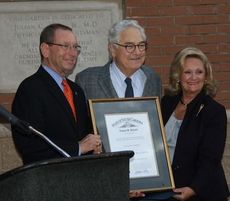 Dr. Julian Josey, center, was presented the Order of the Palmetto by S.C. House Representative Rita Allison, right, and Bruce Holstien; SRHS President and CEO.
