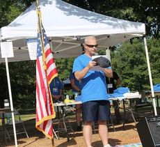 Captain Matt Hamby of the Greer Police Department reads the names of law enforcement officers killed in the line of duty in the Upstate.
 
 