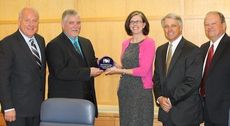 Commissioners and Rob Rhodes of Greer CPW were presented the Emily Hall Tremaine Local Government Energy Leadership Award by the South Carolina Energy Office. Left to right: Perry Williams (commissioner), Rhodes, Jennifer Satterthwaite, and commissioners Jeff Howell and Eugene Gibson.
 
 