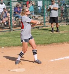 Elizabeth Adams pounded a base hit for the Greer Fire Department.