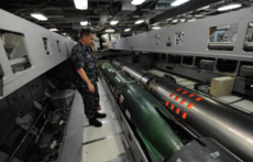 A Mark 48 torpedo (left) and a Tomahawk missile (in the sheath on the right), are being held in cradles. The submarine can carry as many as a dozen torpedoes at any time, but if necessary, the torpedo room can be largely cleared out – it is mostly modular ­– and a Special Forces crew of as many as 36 can be housed here.
 