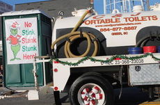 Arguably, the funniest float was the C & J Portable Toilets with the Grinch’s picture aside the words – No Stink Stank Stunk Here!
 
 
 