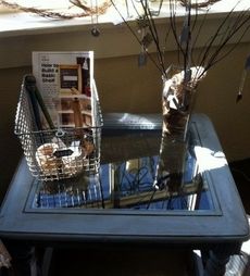 Stephanie McGrath has repurposed the basket and jewelry holder on this table.