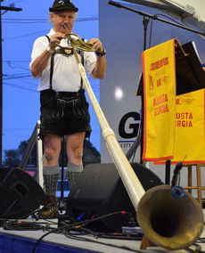 The alpine horn makes its appearance at Oktoberfest.
 