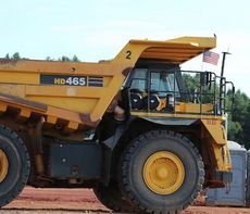 These huge earthmovers are valuable for maneuvering trucks and heavy port supplies that have become mired in the muck.