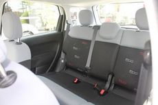 The 4-door Fiat 500L provides extra room for passengers in the back seat.