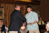 Greer Head Football Coach Will Young presented senior linebacker John Hicks his award.