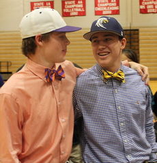 Elijah Henderson, left, and Brandon Southern pal around at Wednesday's signing ceremony.
 