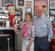 Jim Benson his wife, Evelyn, at the Benson Automotive Memory Lane, which houses his antique car collection,
 